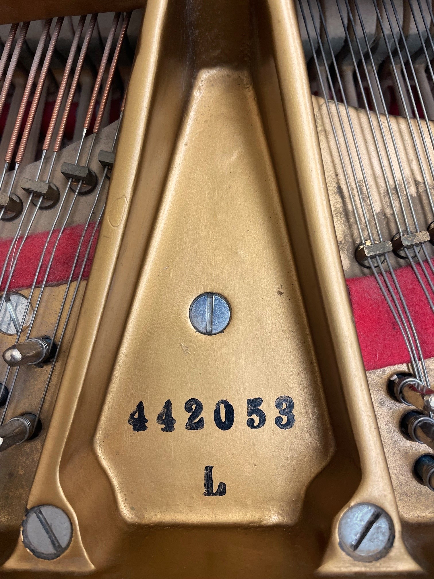 Close-up of Steinway model L piano serial number 442053.